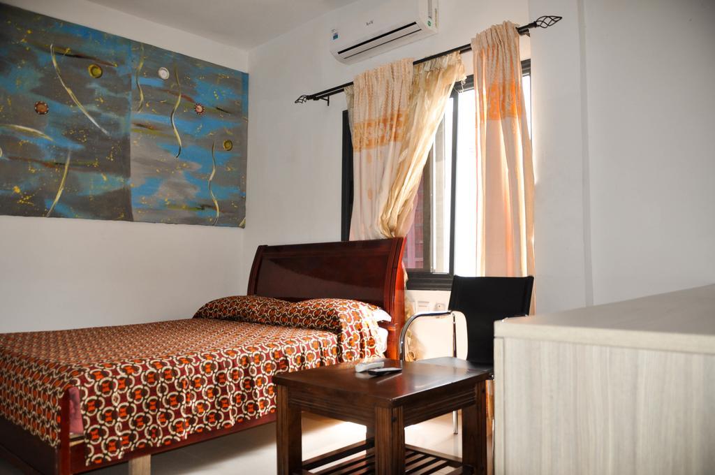 Guest House Lumen Ломе Экстерьер фото