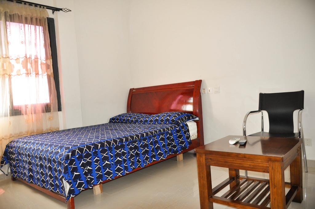 Guest House Lumen Ломе Экстерьер фото