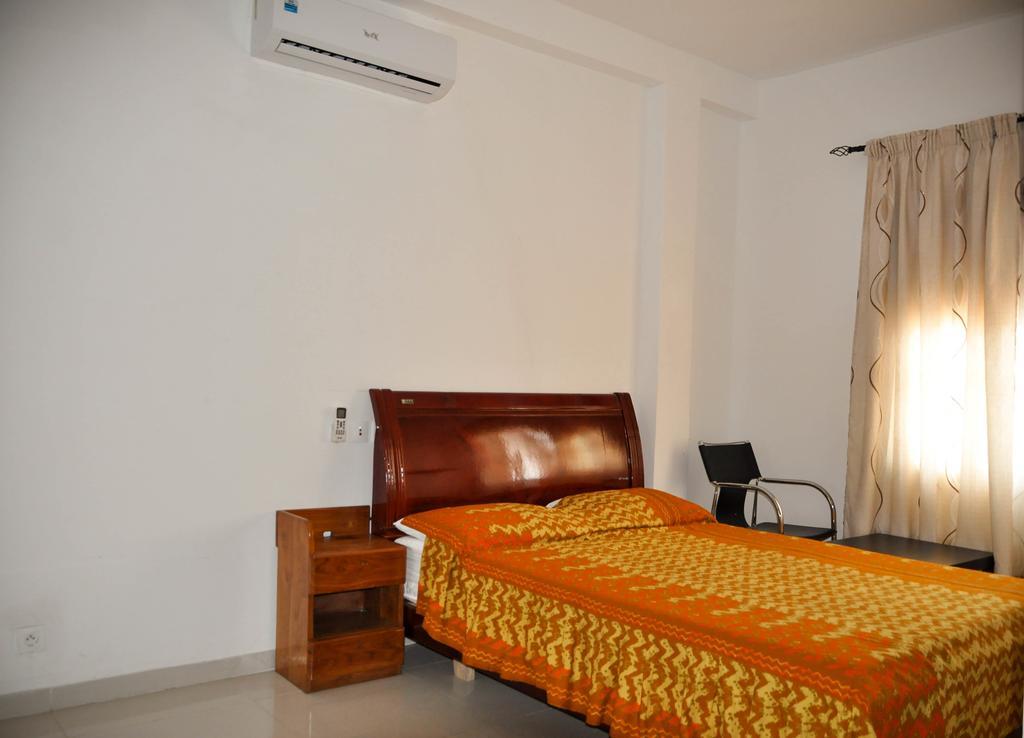 Guest House Lumen Ломе Экстерьер фото
