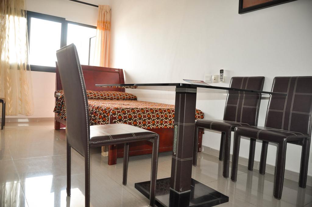 Guest House Lumen Ломе Экстерьер фото